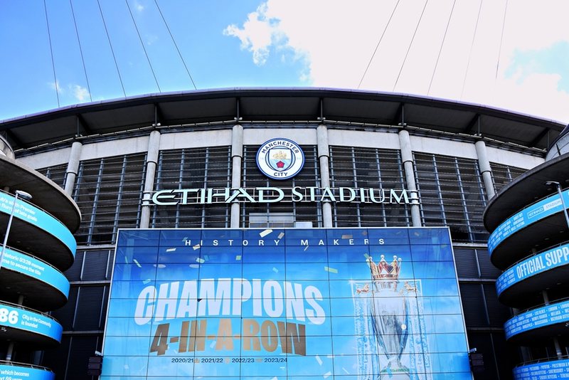 Manchester City Etihad Stadium with Champions 4 in a Row Banner